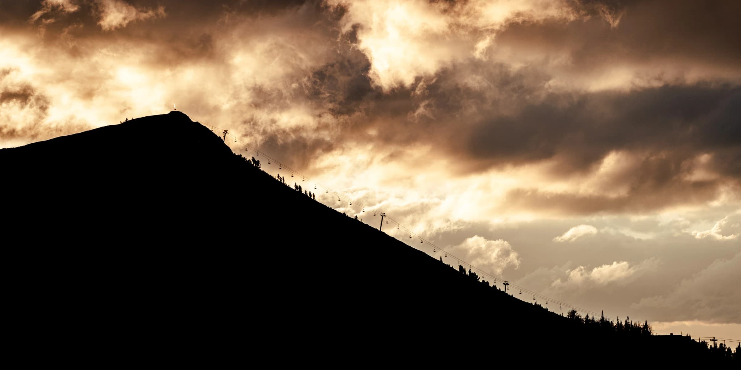 Resort and commercial media — cinematic drone panorama over mountain resort by Fiddlehead Media